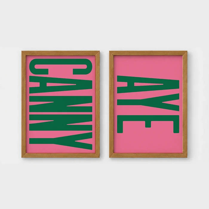 Set of 2 framed prints, Newcastle & Geordie dialect prints: the word "Canny" in bold green retro type on pink; and the word "Aye" in bold green retro type on pink — unframed