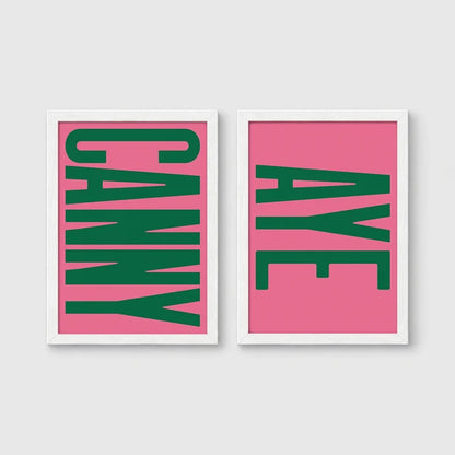 Set of 2 framed prints, Newcastle & Geordie dialect prints: the word "Canny" in bold green retro type on pink; and the word "Aye" in bold green retro type on pink — unframed