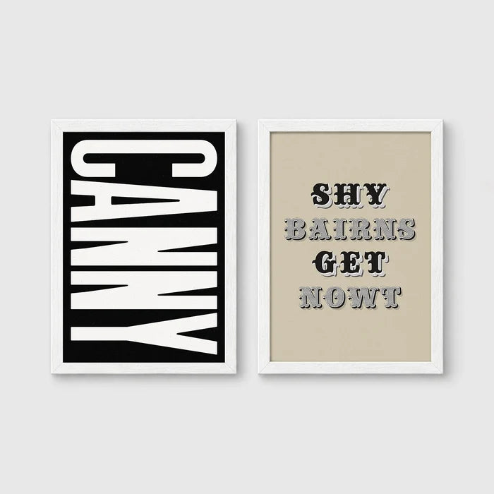 Set of 2 framed prints, Newcastle & Geordie dialect prints (black & white): the word "Canny" in bold black and white type; and the Geordie slogan "Shy Bairns Get Nowt" in bold black and white type — unframed