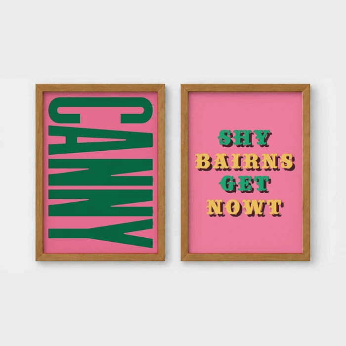 Set of 2 framed prints, Newcastle & Geordie dialect prints: the word "Canny" in bold green retro type on pink; and the Geordie slogan "Shy Bairns Get Nowt" in bold retro type on pink — unframed