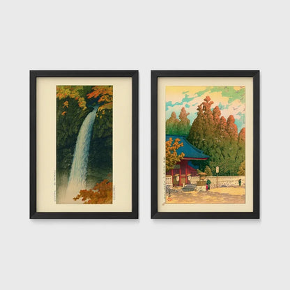Set of 2 framed prints, Kawase Hasui Japanese woodblock prints: a waterfall cascading through autumn foliage; and a red pagoda gate in an autumn forest — unframed
