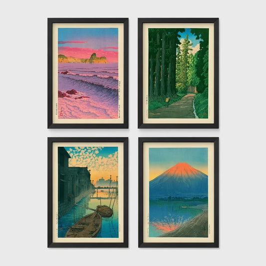 Set of 4 framed prints, Kawase Hasui Japanese woodblock prints: pink sunset over ocean waves and cliffs; a cedar forest path with a lone walker; boats moored on a canal at dawn beneath a cloud-streaked sky; and Mount Fuji glowing red at sunset, reflected in the water — unframed
