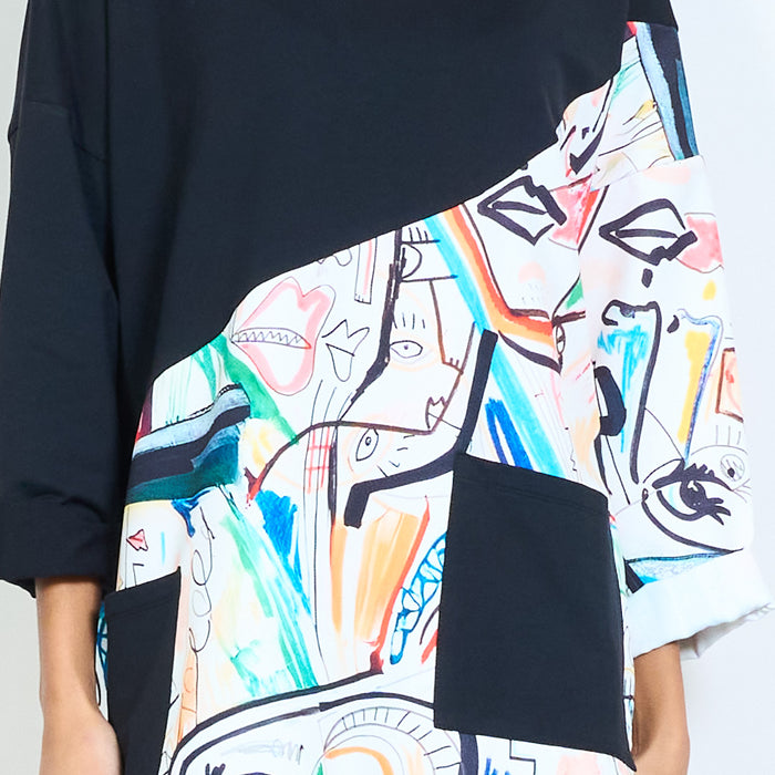 Oversized asymmetric abstract face print contrast panel top wholesale