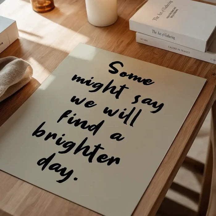 Some Might Say 2025 Oasis Lyrics Print, music art print unframed on a home office desk