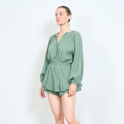 Textured button front elastic waist ruffle hem playsuit wholesale